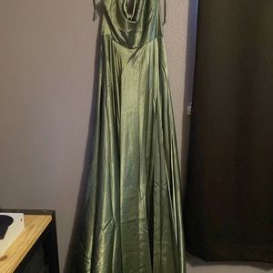 Its a green satin dress from dancing queen